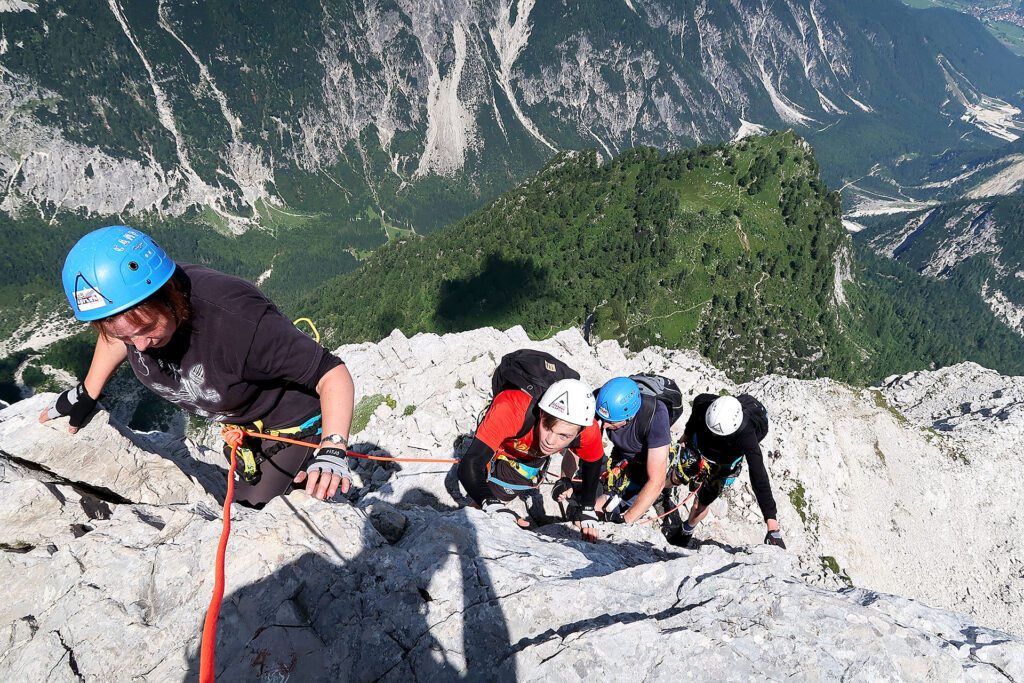 guided ascent on secured climbing route mala mojstrovka