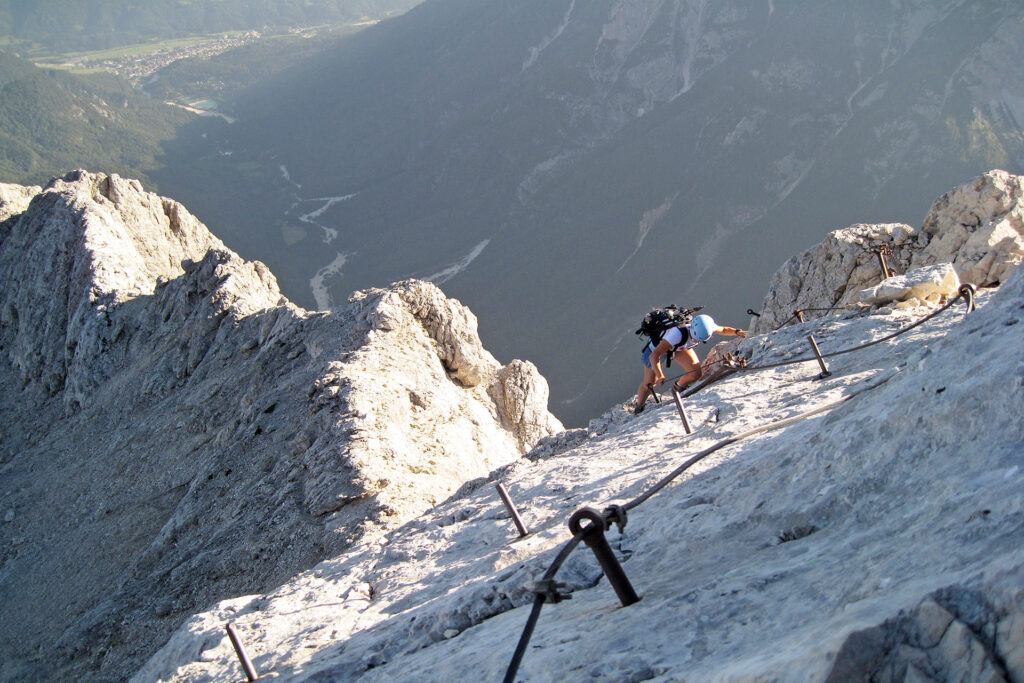 Guided trip secured climbing route Hanzova and Kopiščarjeva route in Prisank