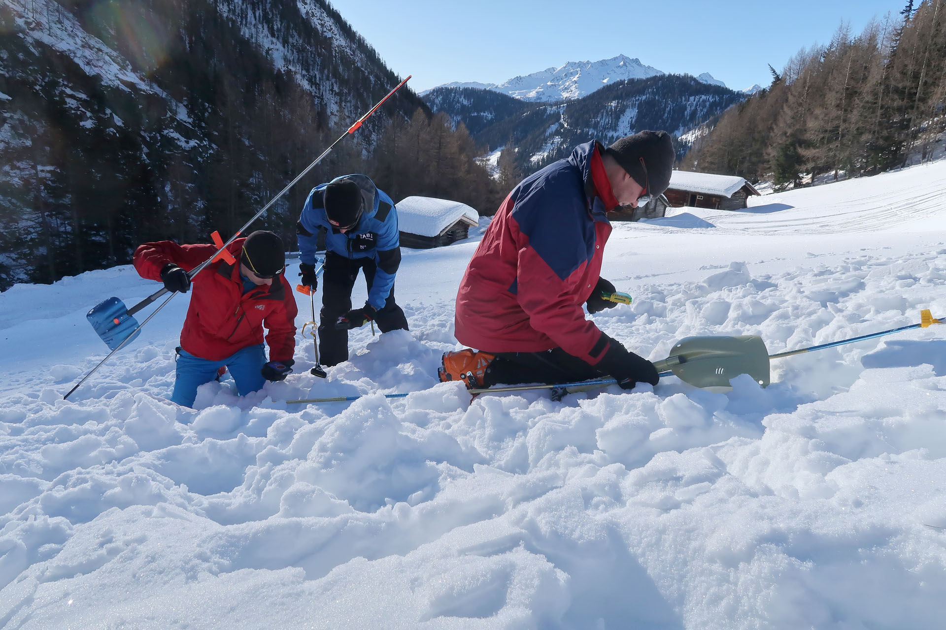 Avalanche workshop at ski touring course for beginners in Slovenia