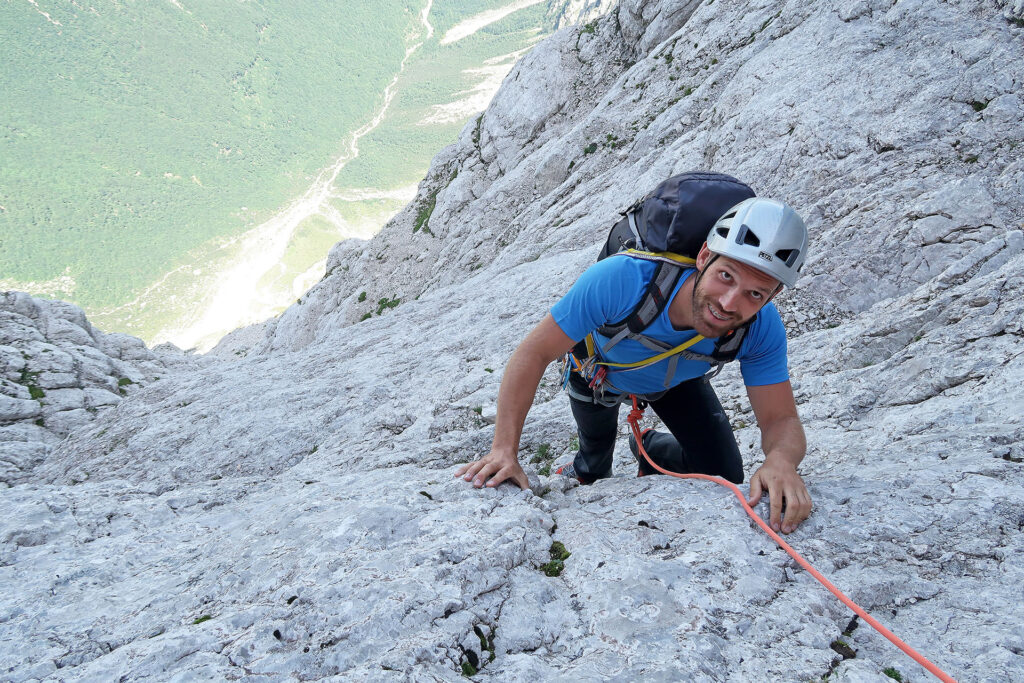 German route guide climb in Triglav north wall with IFMGA guides