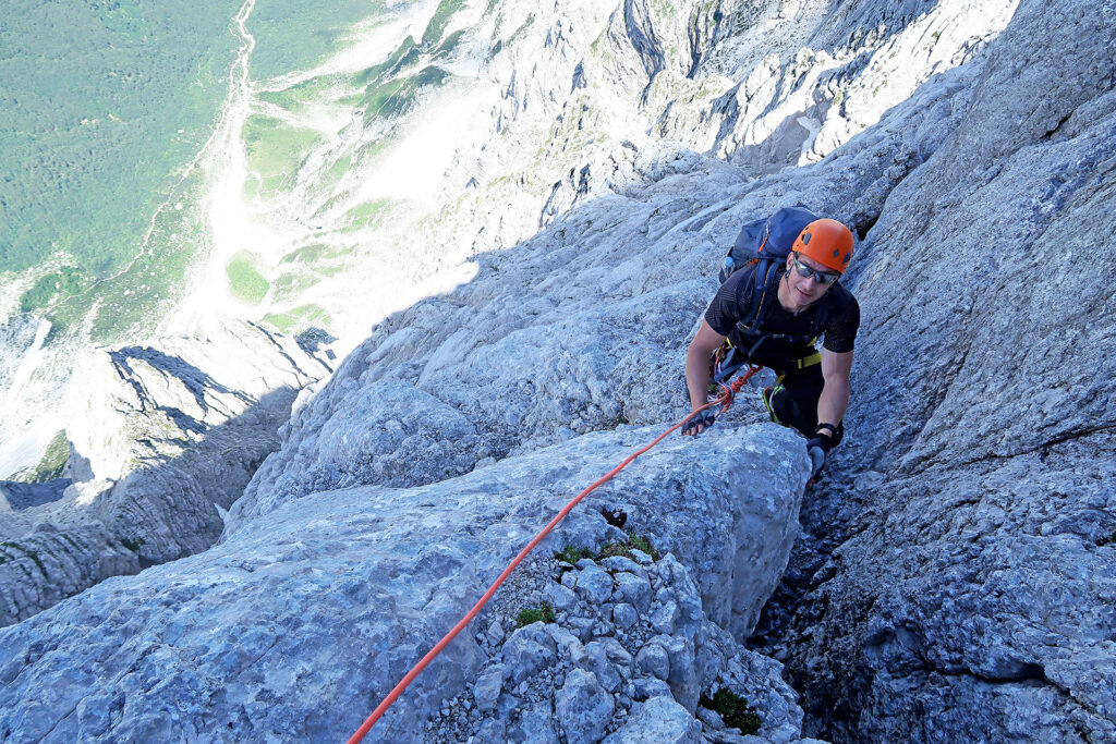 Guided climb in Long German route in Triglav north wall with IFMGA guides