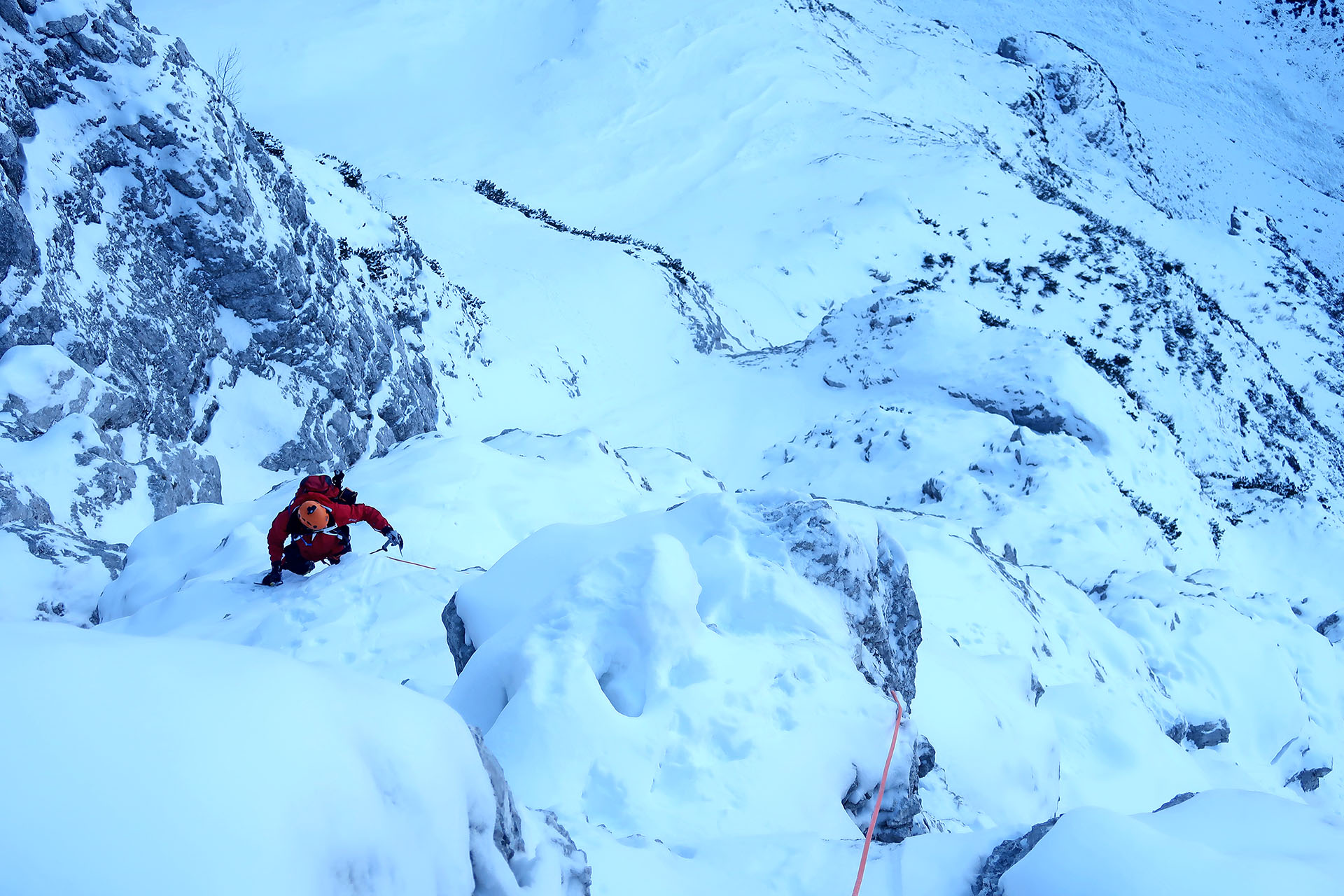 Guided climb in Slovenian route in winter conditions in Triglav north wall
