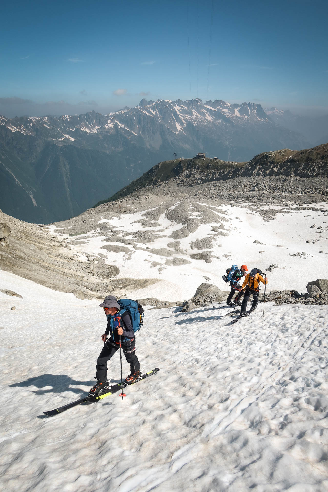 Crossing the ridge during a ski tour ascent of Mont Blanc with a guide.