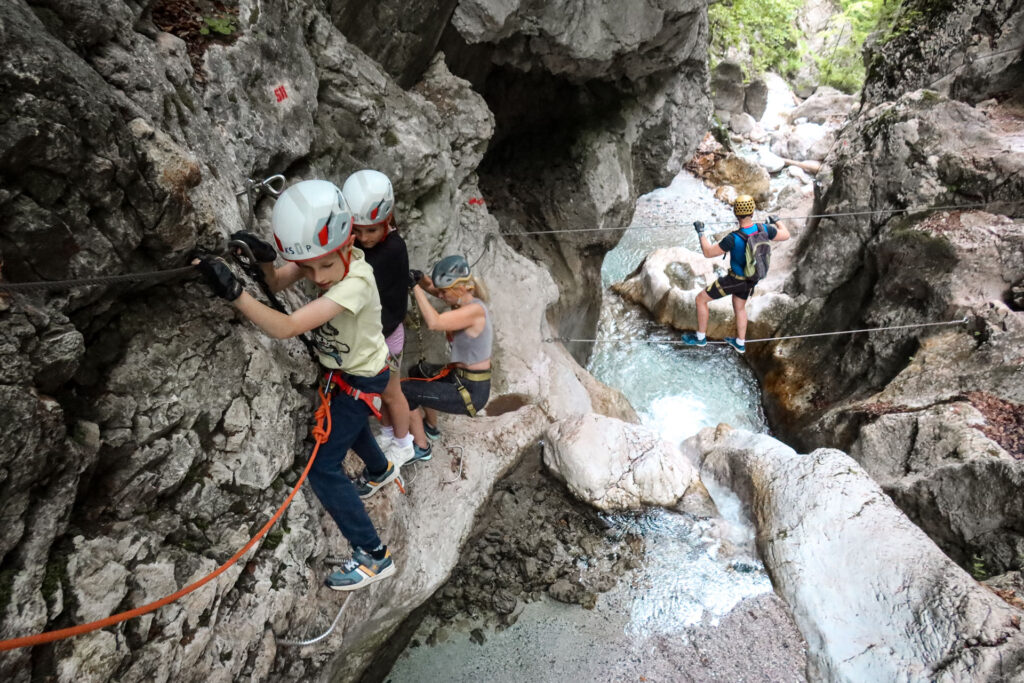 Climb a via ferrata trough a gorge and be rewarded with a view over Julian Alps
