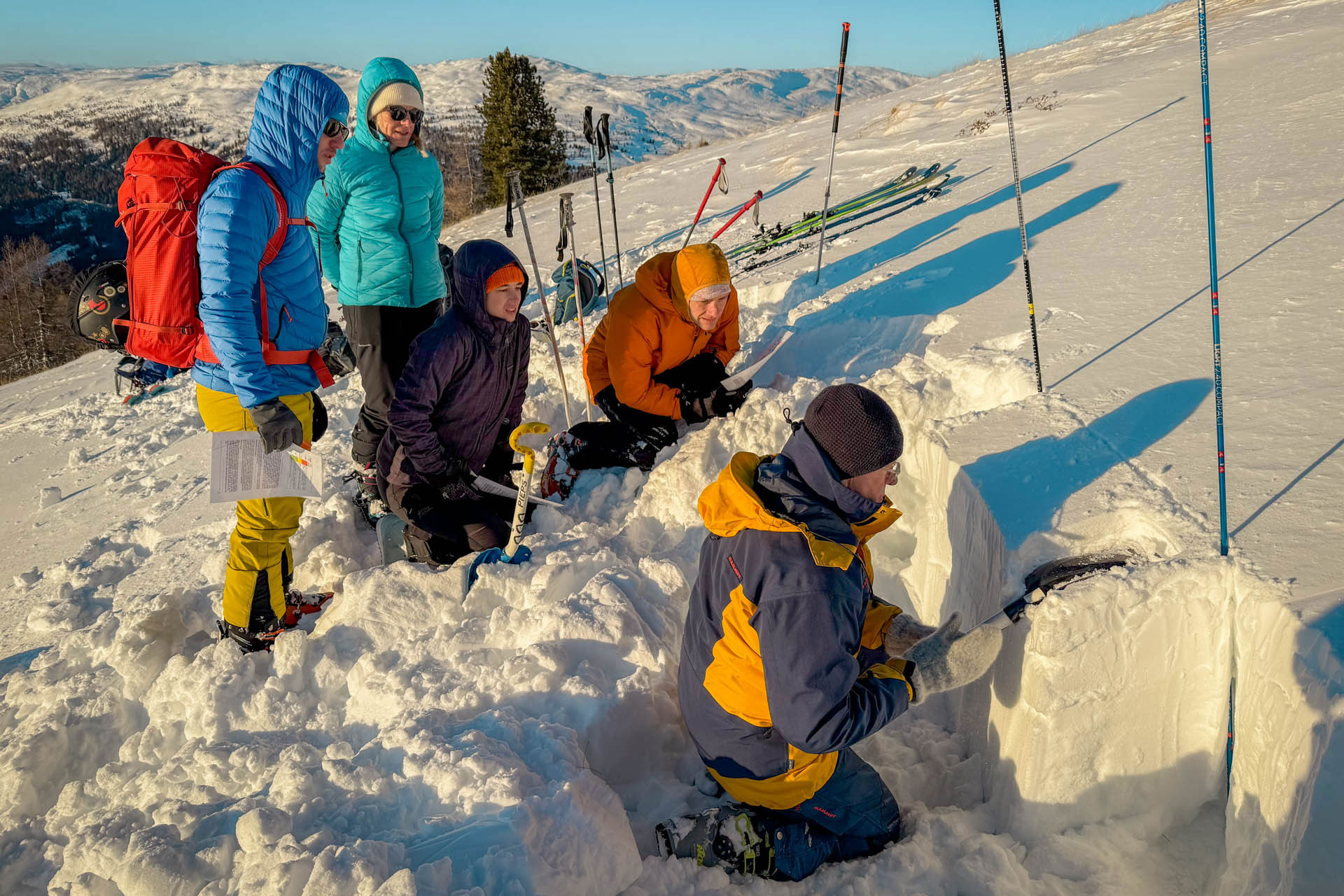 Avalanche workshop at ski touring course for beginners in Slovenia